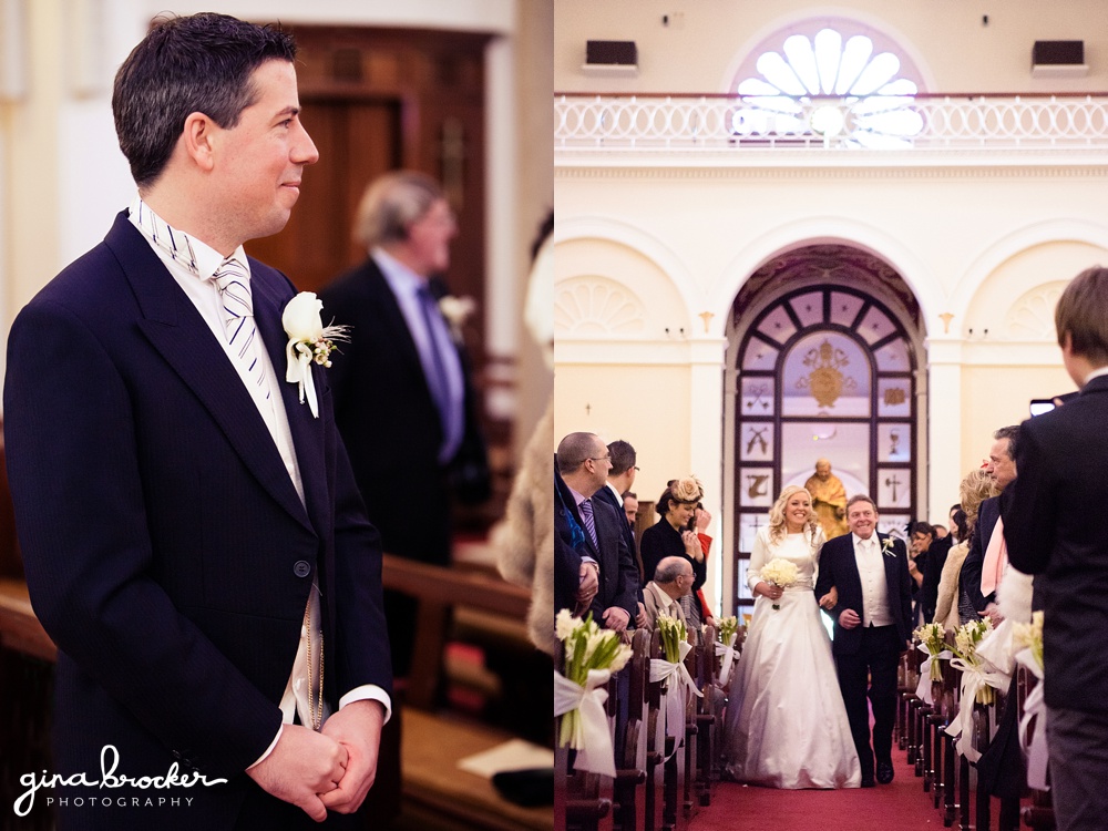 Groom waits at the top of the church while the bride walks up the aisle with her father