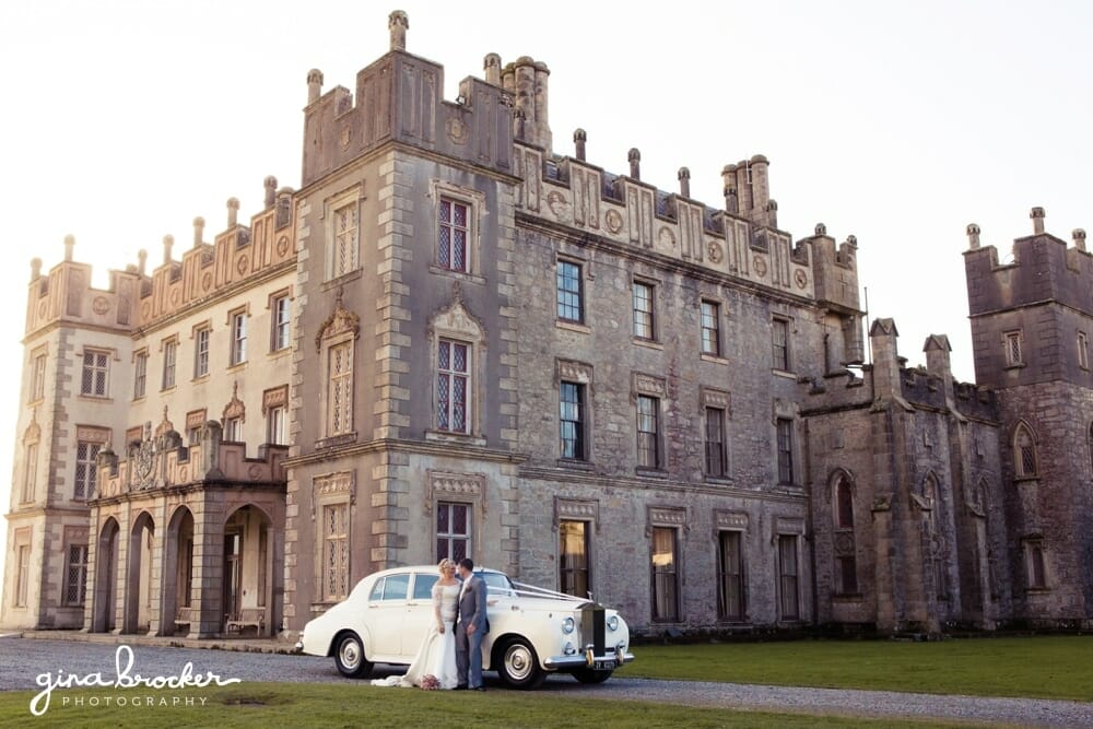 Bride and Groom romantic with castle and wedding car