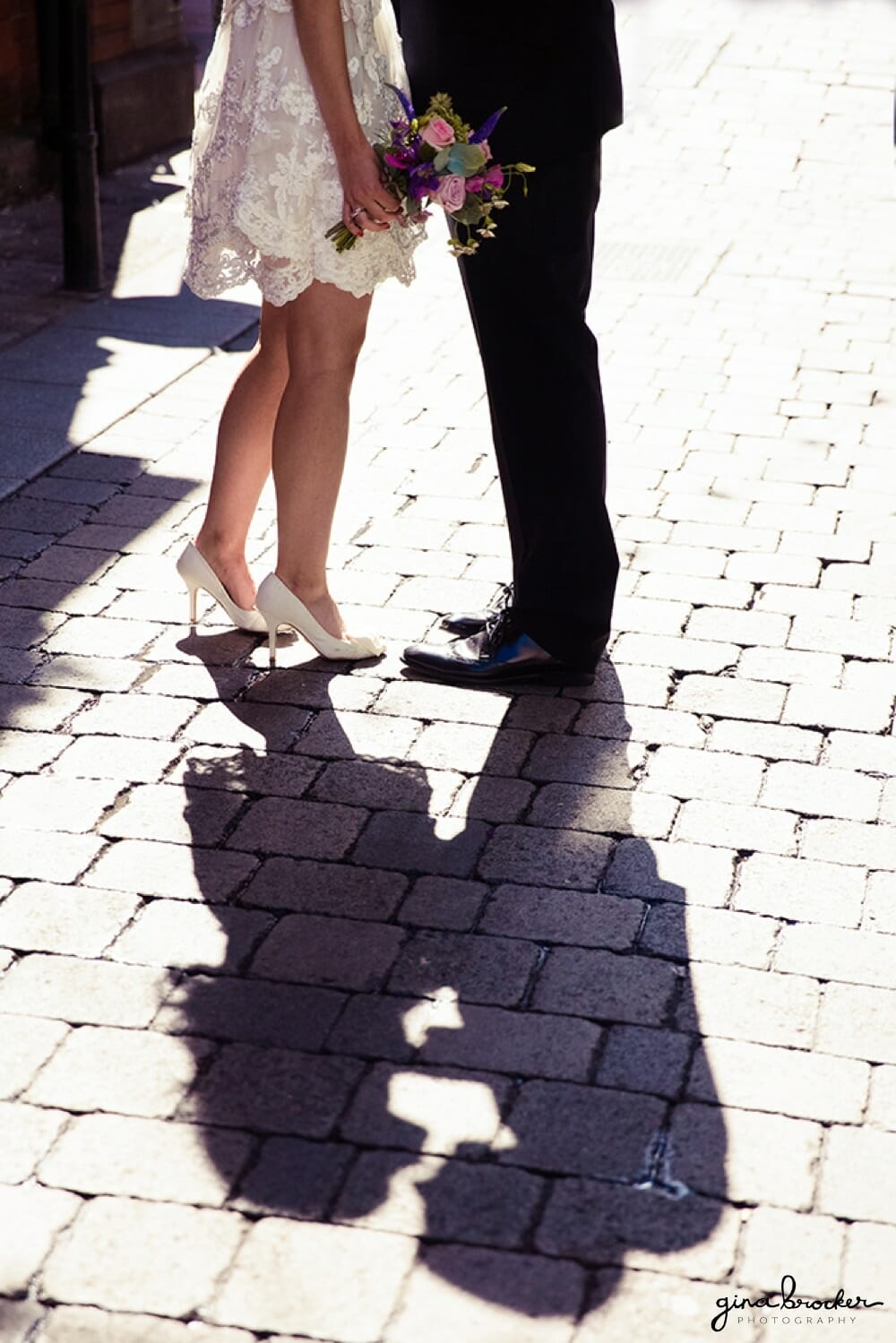 Bride and Groom Kiss in the Street