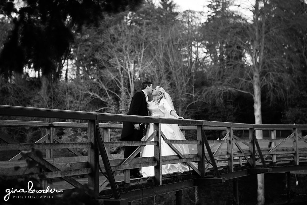 classic winter wedding bride and groom on bridge