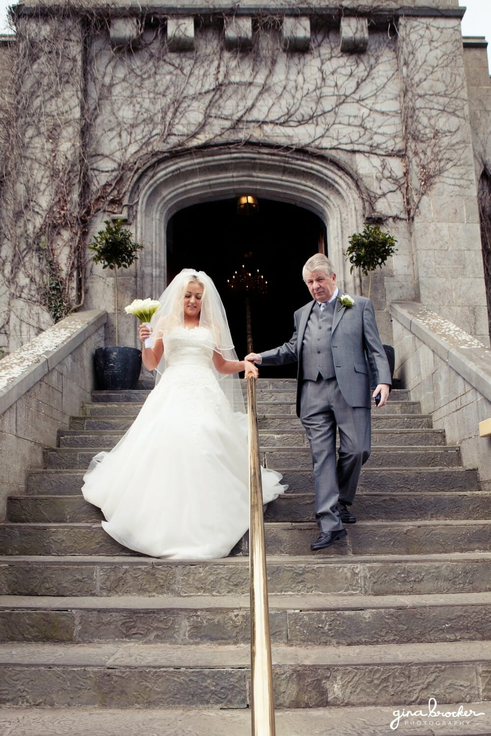 bride leaving for church with father