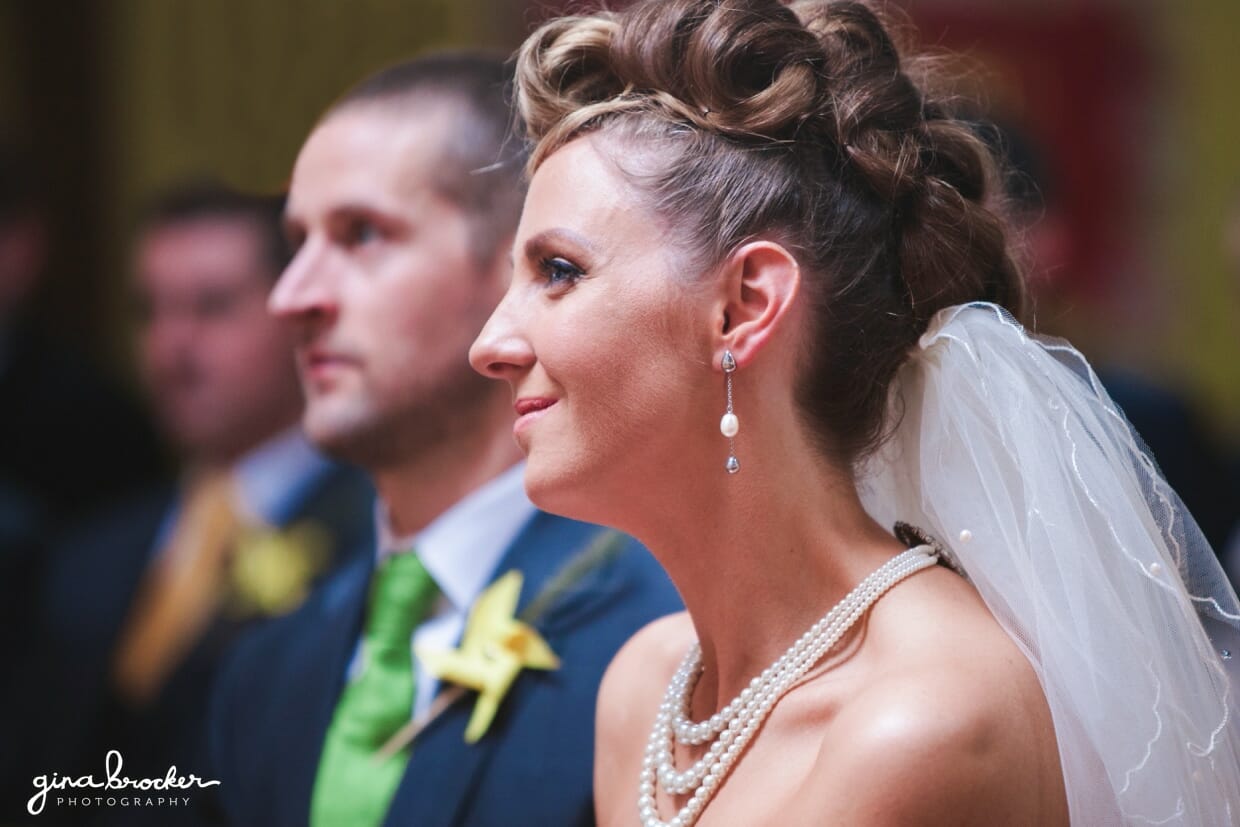 bride smiles during the wedding ceremony 