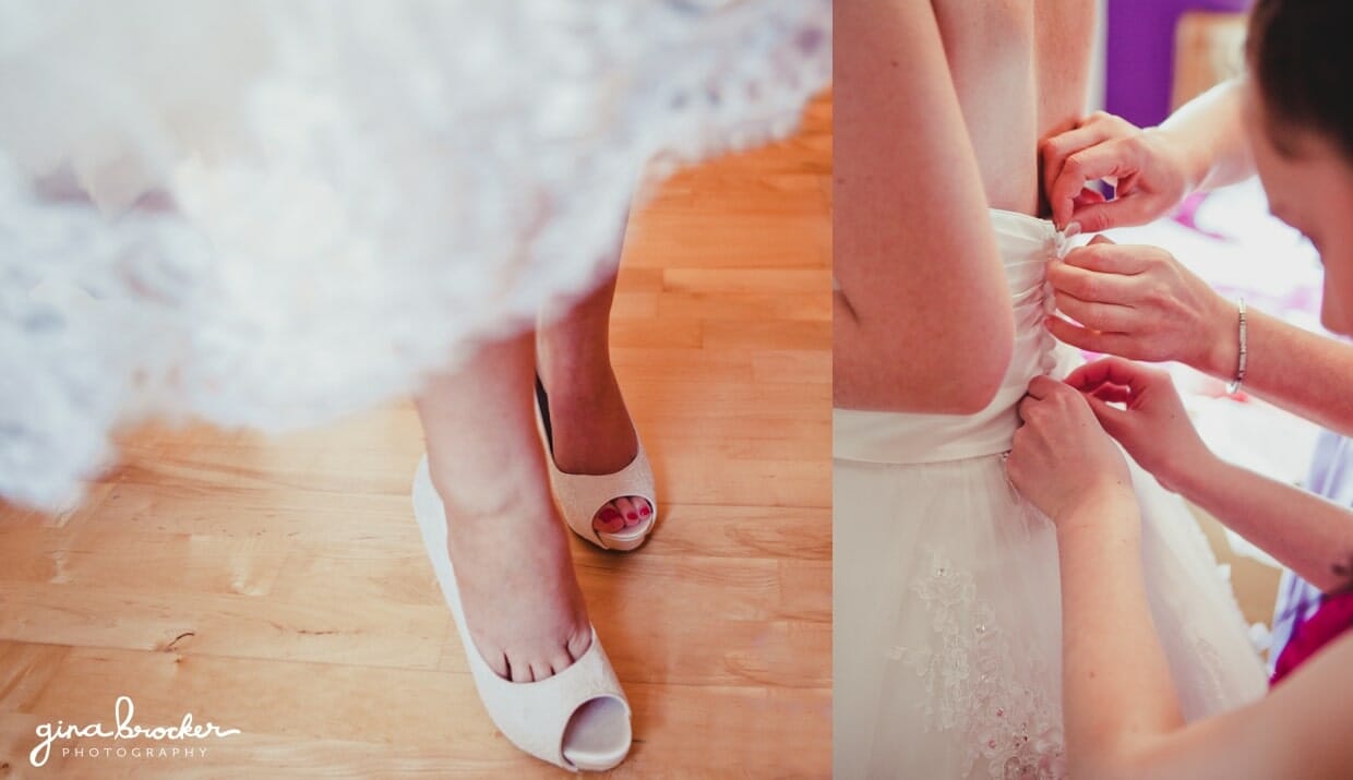 A bride puts on her shoes and fastens her tea length retro style wedding dress before her spring wedding