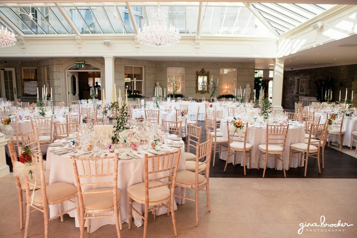 A beautiful conservatory decorated with colorful and elegant wedding details