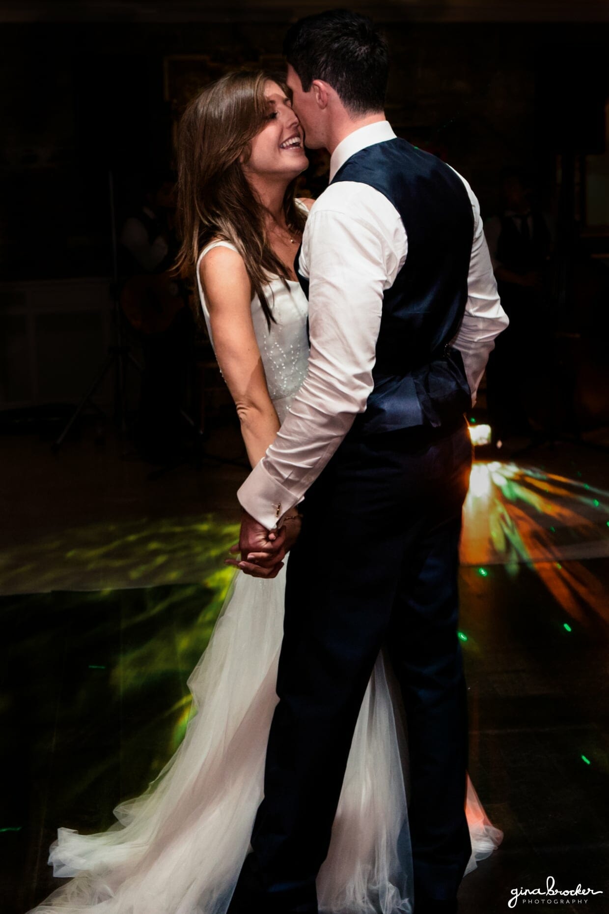 The bride and groom share a sweet moment during their first dance as husband and wife