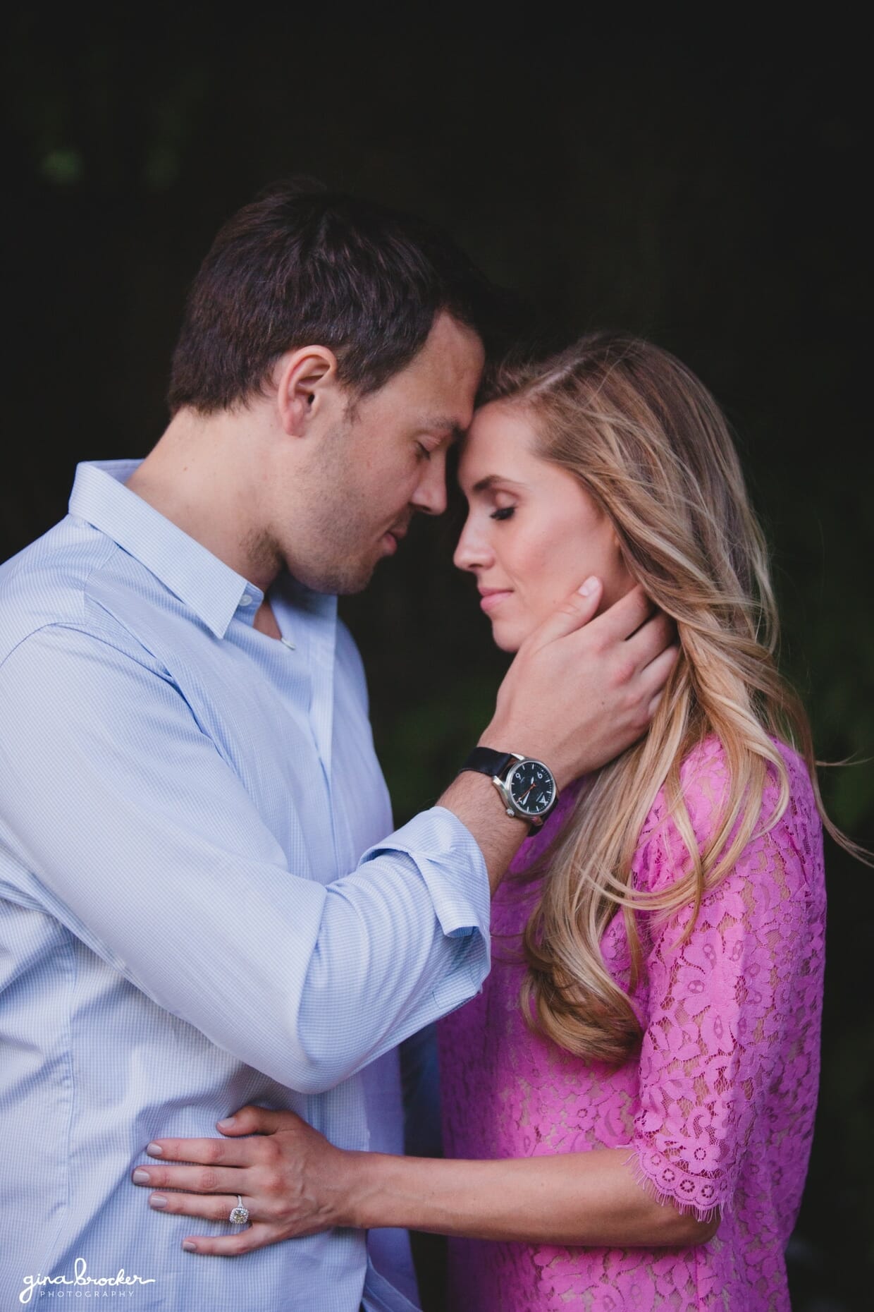 A romantic portrait of a couple touching foreheads during their prospect park engagement session in brooklyn, new york