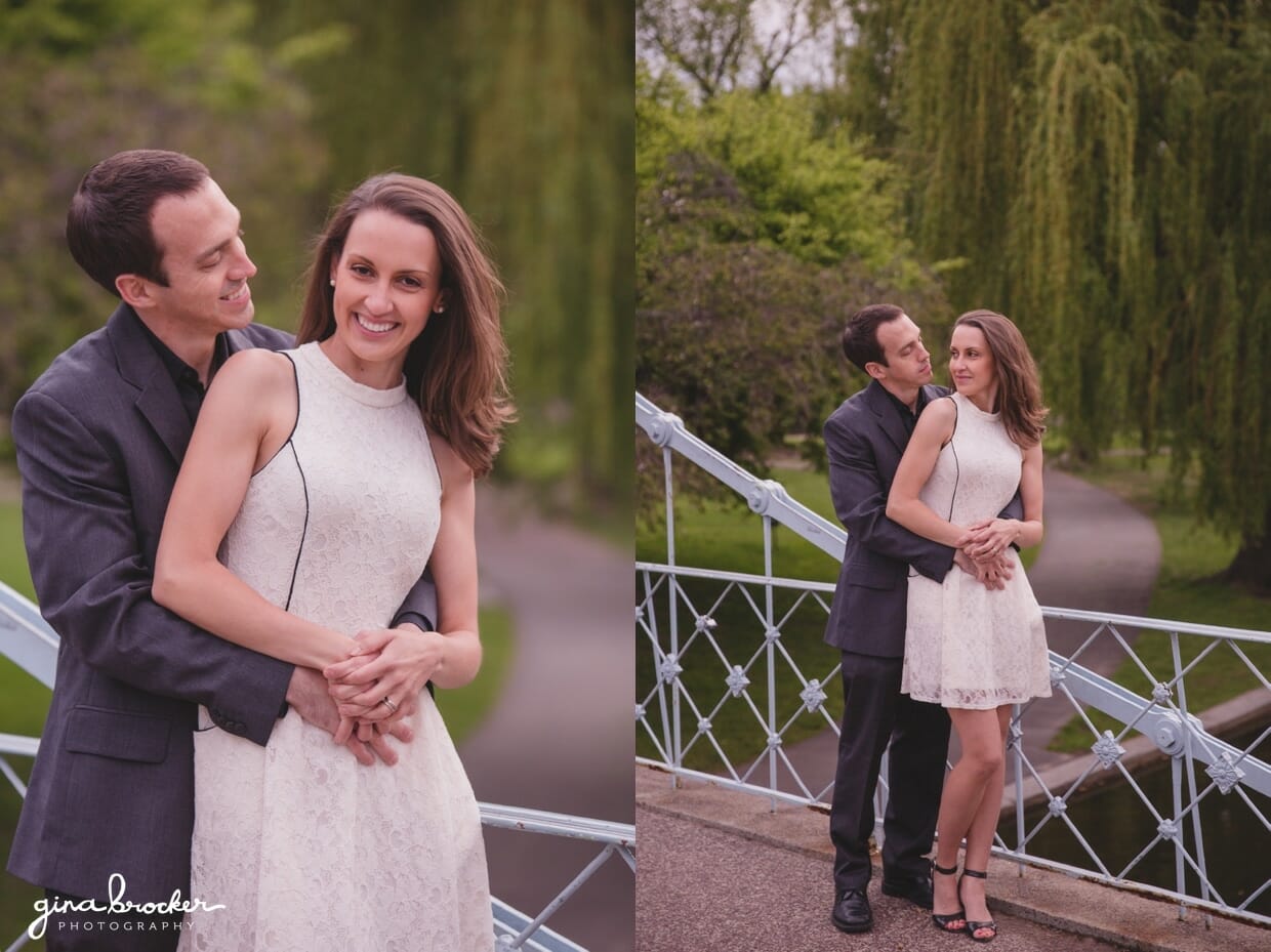 A couple cuddle and laugh on the bridge of the Boston Public Gardens during their sweet engagement session