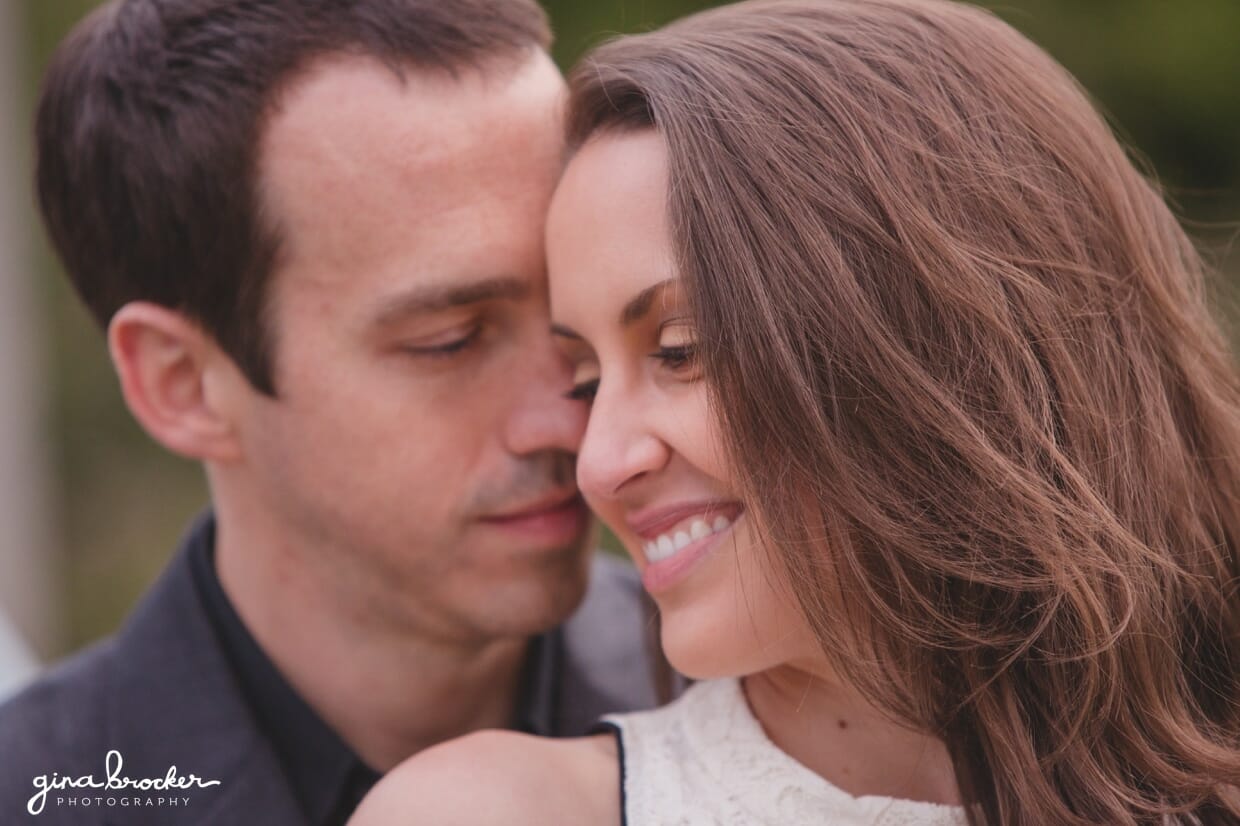 An intimate portrait of a couple during their sweet engagement session in the Boston Public Gardens