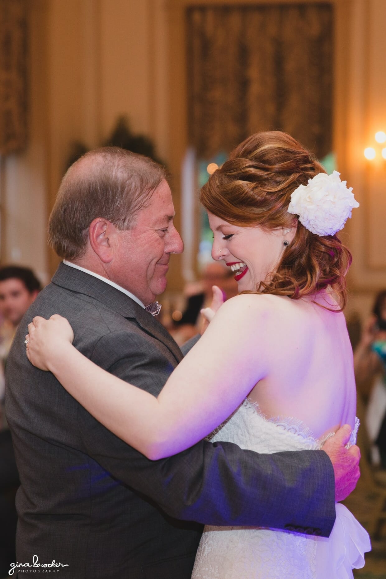 A sweet moment captured during the father daughter dance at a wedding in the Hawthorne Hotel in Salem Massachusetts