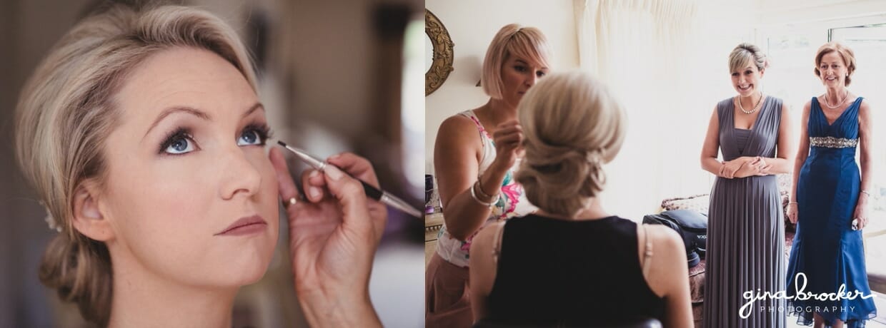 Bridesmaids look on with excitement at a bride get her makeup done before her classic garden wedding