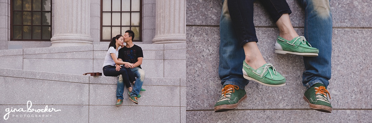 A sweet photograph of couple as they sit on a wall of the Boston Museum of Fine Art during their engagement session