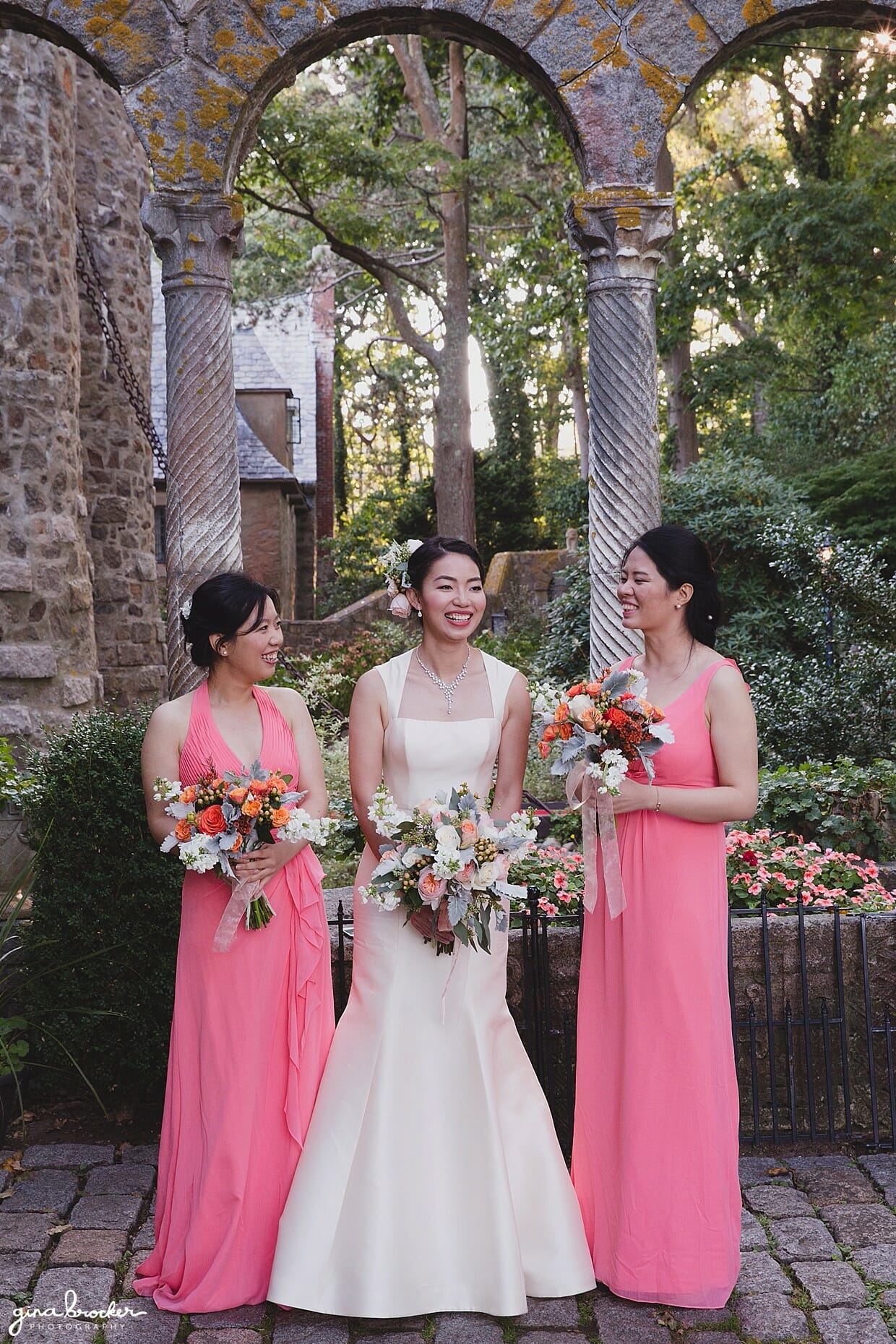 A portrait of a bride with her bridesmaids at Hammond Castle during their Gloucester Wedding