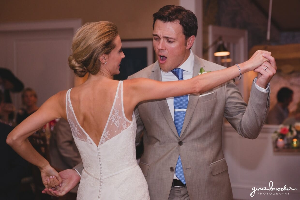A bride and groom have fun during their first dance as husband and wife at their Westmoor Club wedding in Nantucket, Massachusetts