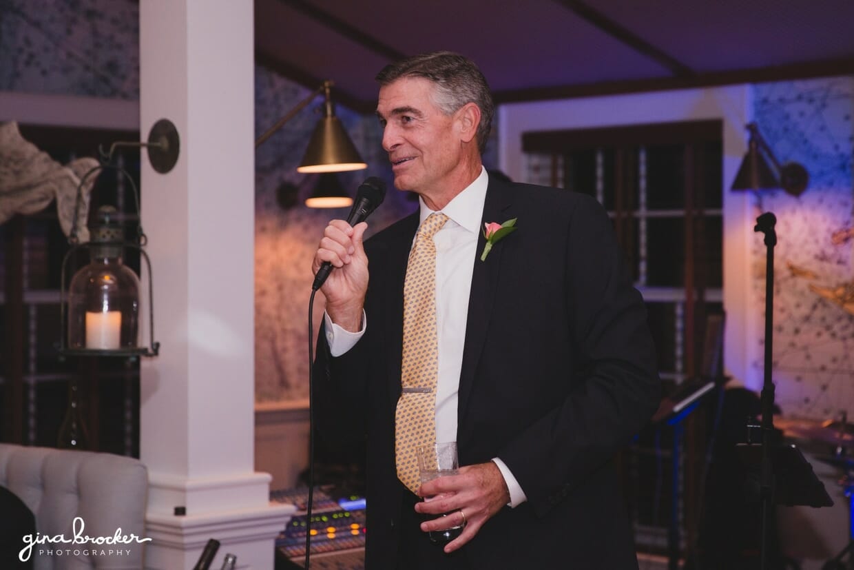 A candid photograph of the father of bride during his wedding speech at the Westmoor Club in Nantucket, Massachusetts