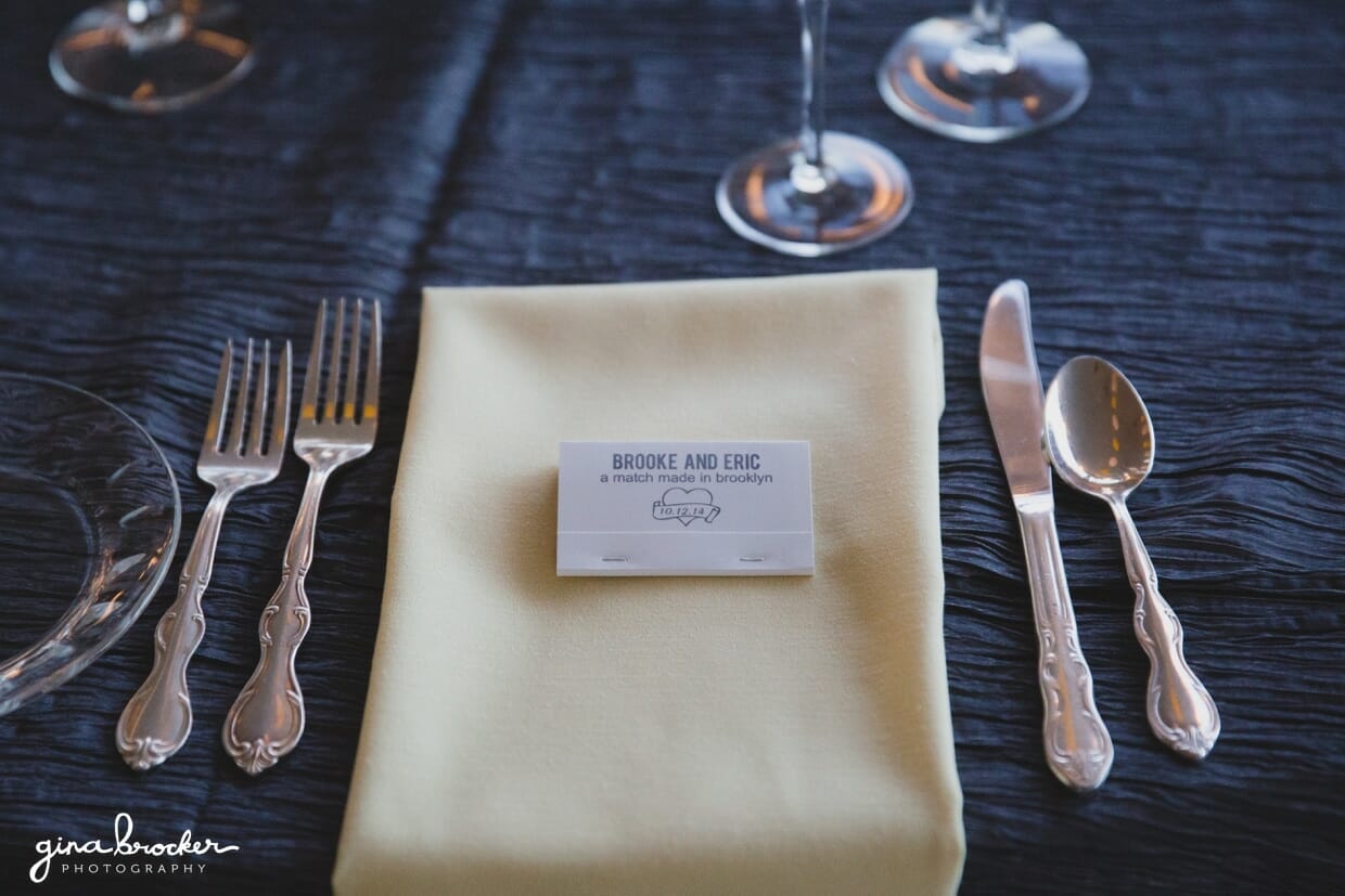 A personalized wedding favor decorates the tables of a farm wedding in Oxford, Massachusetts