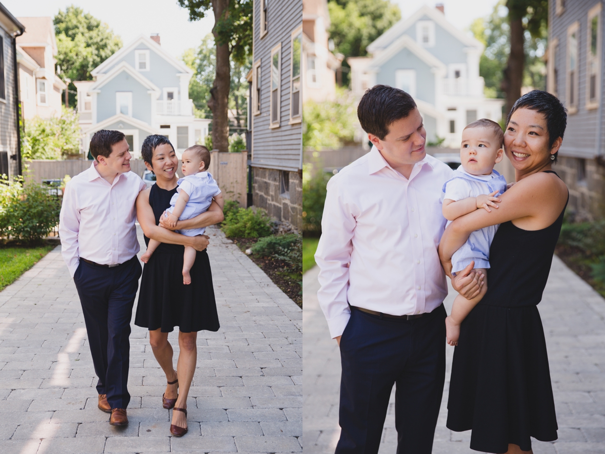 A sweet photograph of a family walking outside their Jamaica Plain home during a family photo session