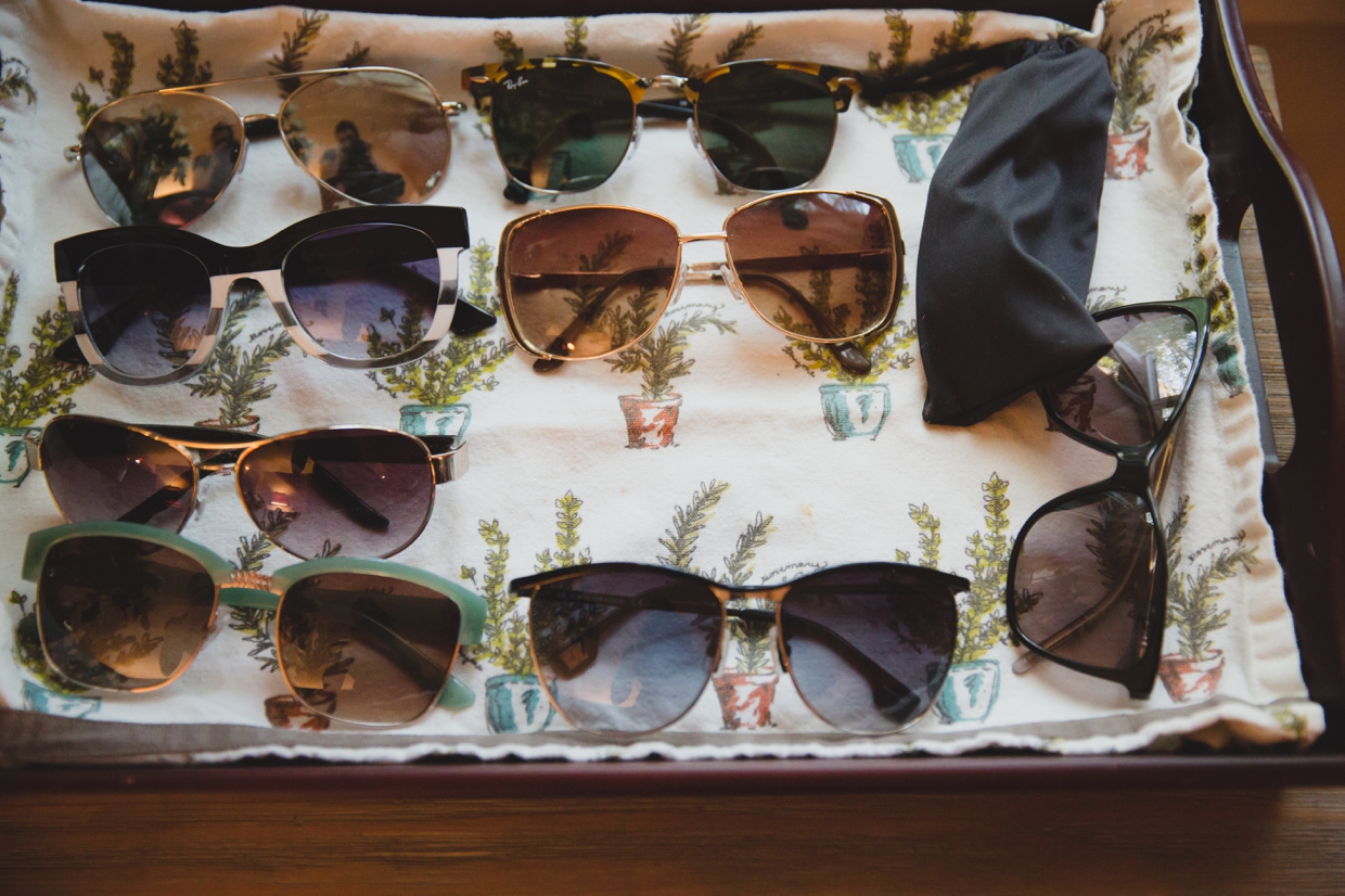A detailed photograph of sunglasses during a backyard wedding in Massachusetts