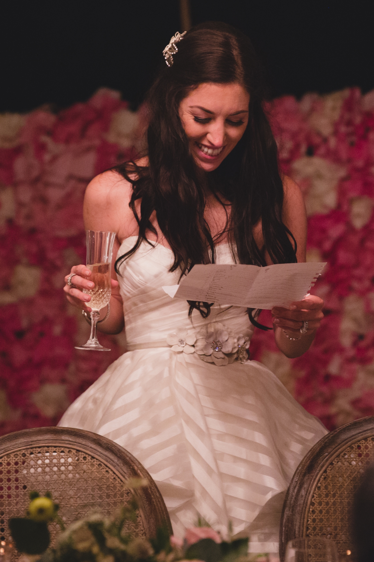 A bride makes a heartfelt toast during her backyard wedding in Massachusetts