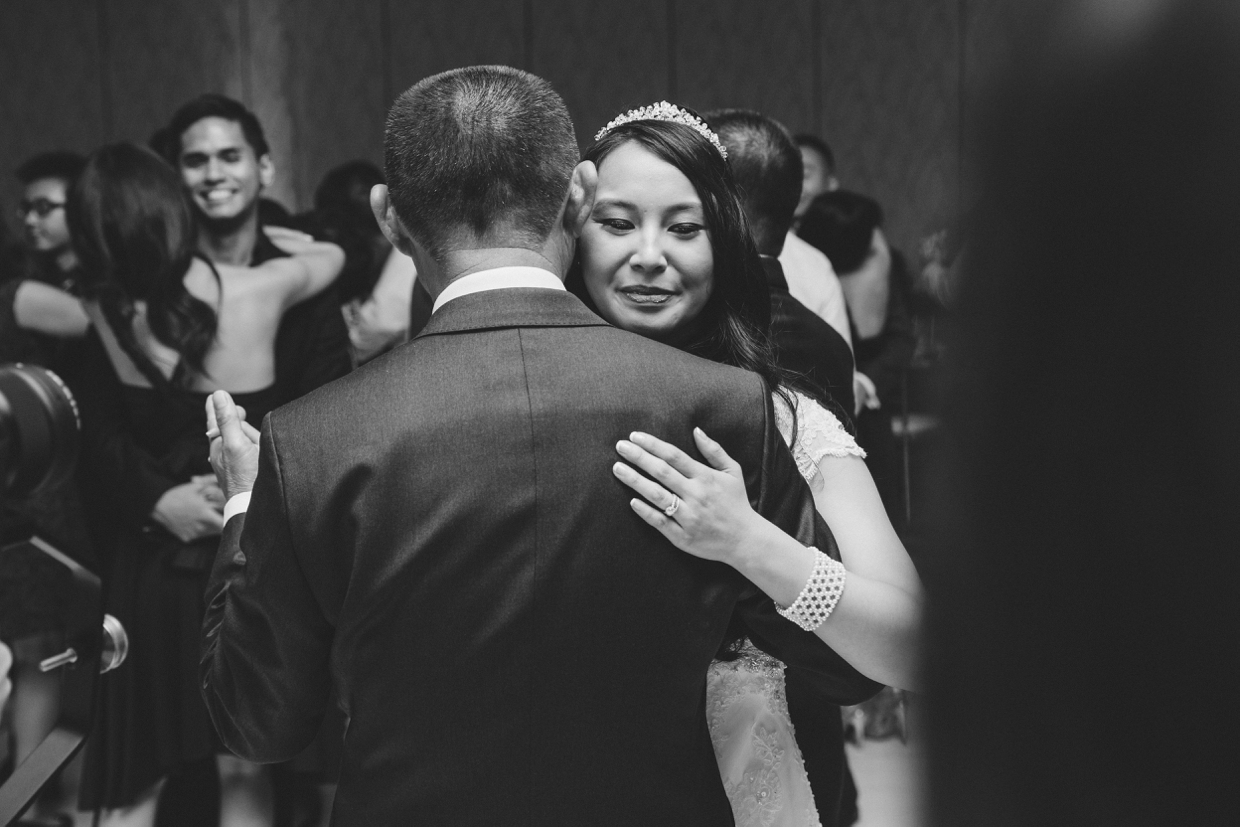 A sweet photograph of a bride dancing with her father during her wedding at the Boston Marriott Hotel