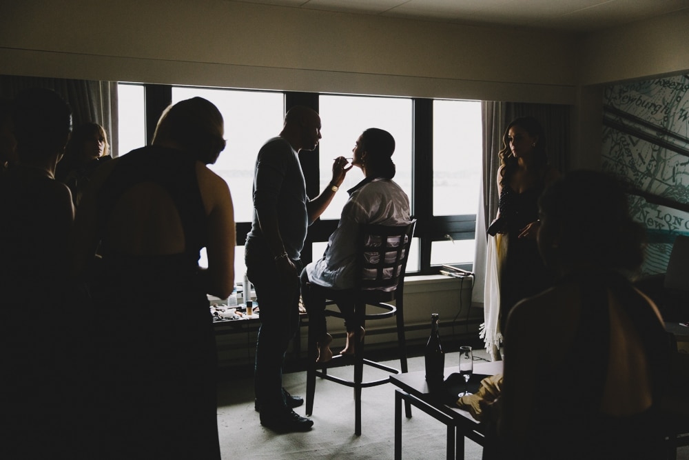 A documentary photograph of a bride getting ready with her bridesmaids at the Hyatt Regency Hotel in Newport, Rhode Island