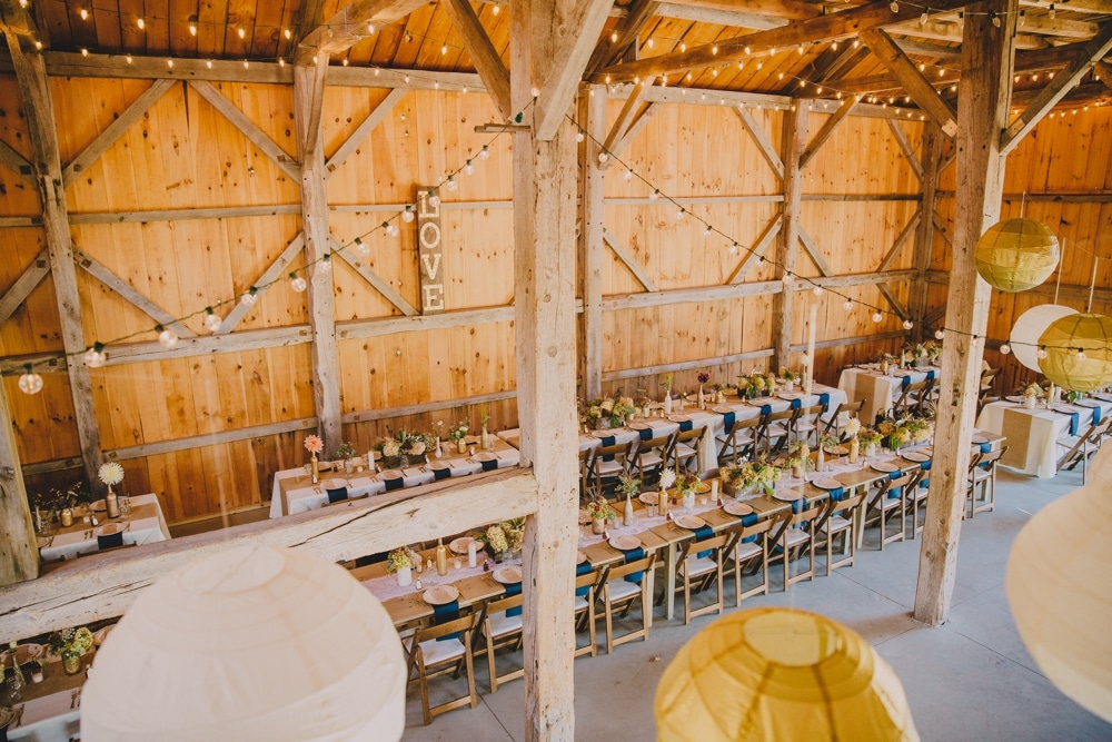 An artistic photograph of rustic DIY barn wedding decor at Kitz Farm in New Hampshire