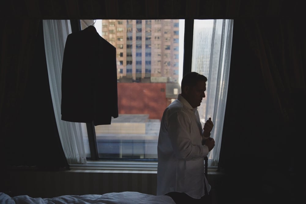 A groom gets ready for his State Room Wedding at the Langham Hotel in Boston