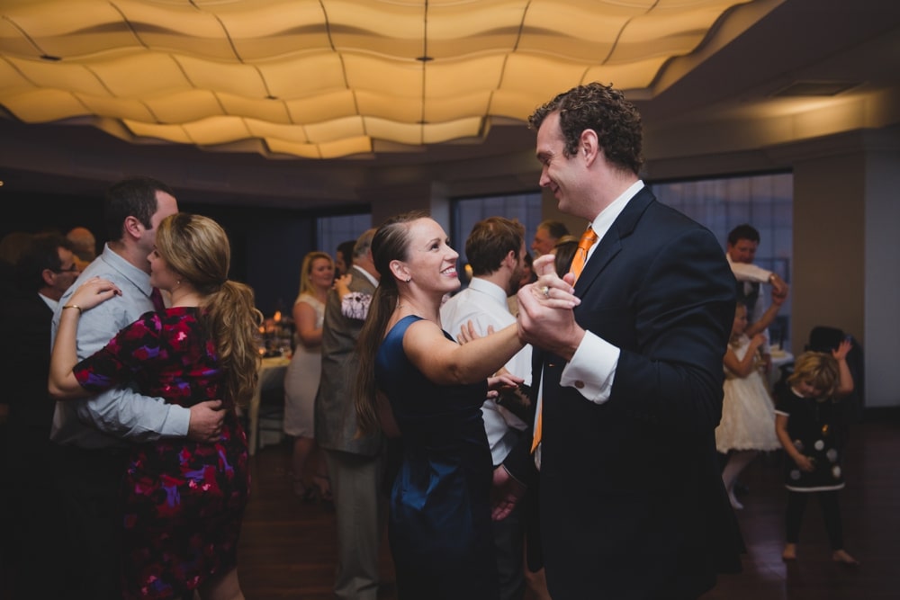 A photojournalistic photograph of a couple dancing at a State Room Wedding in Boston