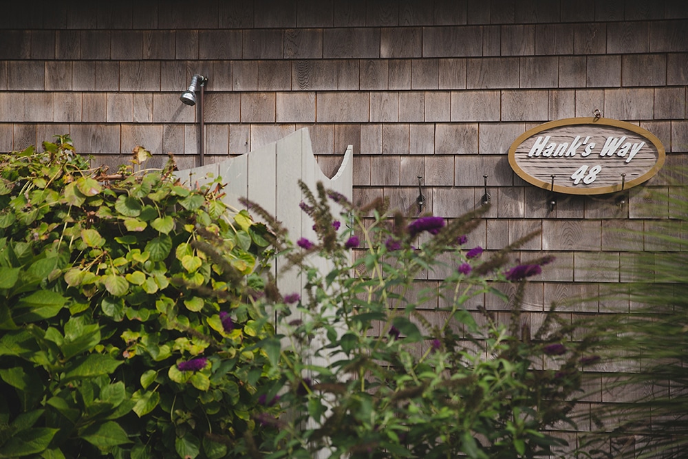 A detailed photograph of the grooms family home during his Martha's Vineyard Wedding
