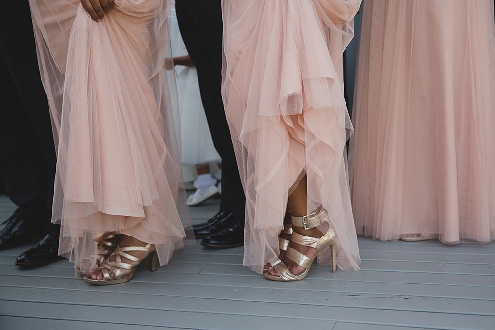 A documentary photograph of bridesmaids waiting to walk down the aisle at a Martha's Vineyard Wedding