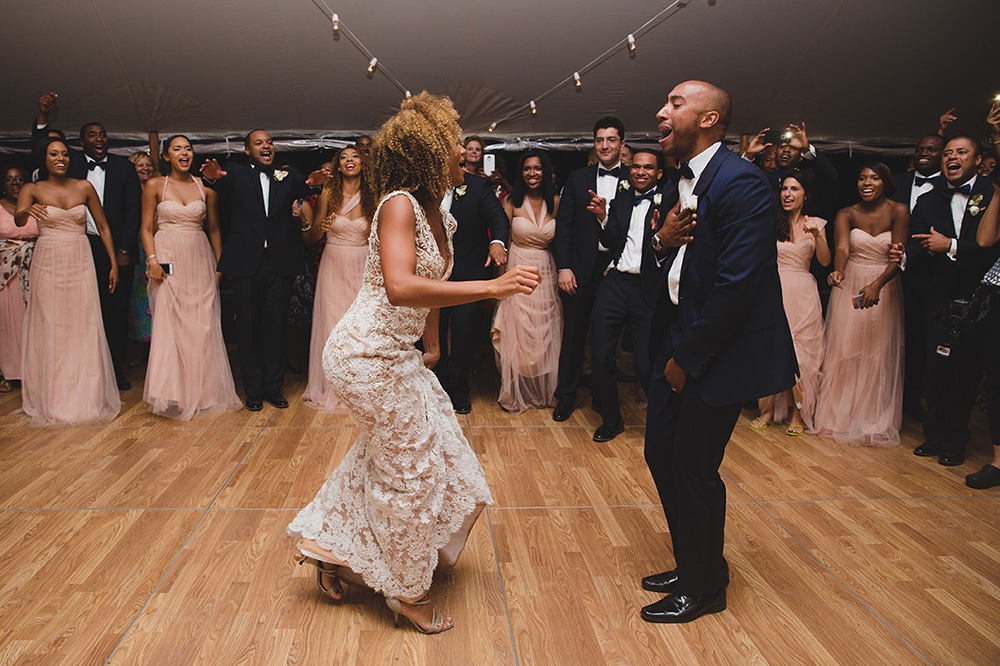 A documentary photograph of a bride and groom dancing during their Martha's Vineyard Wedding