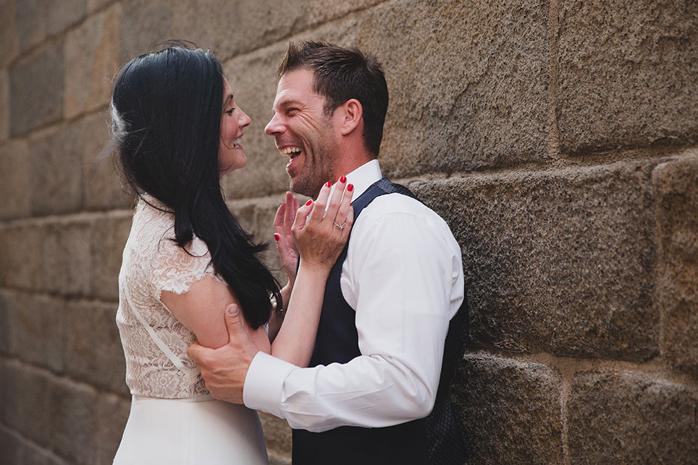 A documentary portrait of couple laughing during their Boston Engagement Session