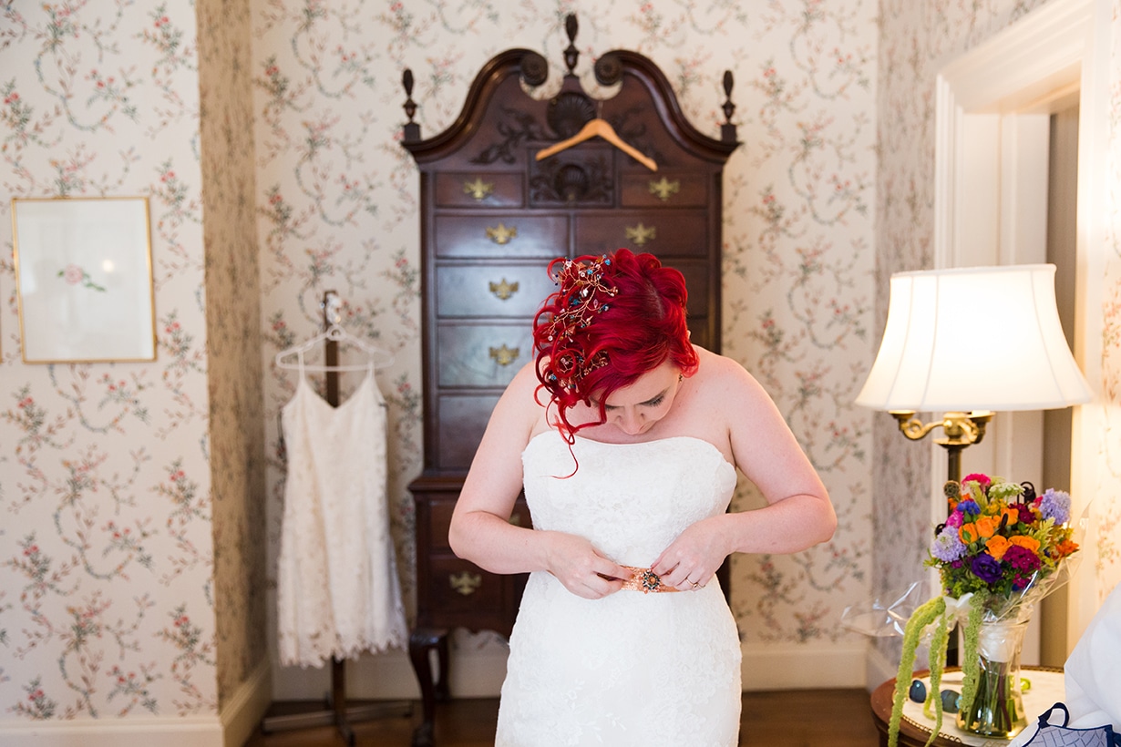 A documentary photograph of a bride getting ready before her Lyman estate wedding in Boston, Massachusetts