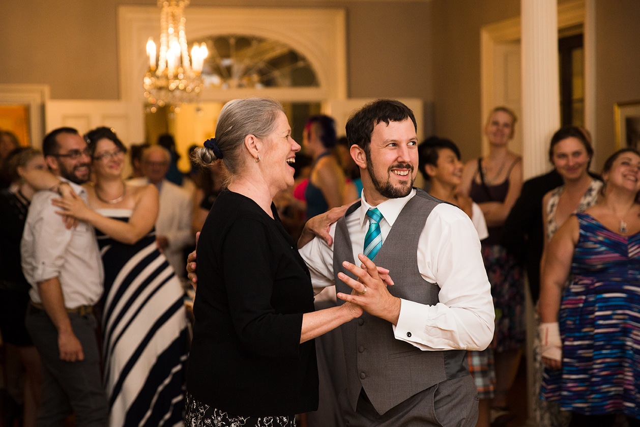 A documentary photograph of a mother son dance at a Lyman Estate Wedding in Boston, Massachusetts