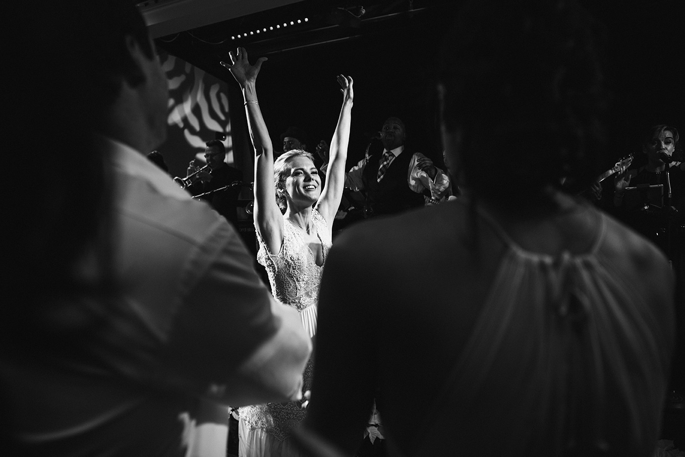 This documentary photograph of a bride dancing at her nantucket wedding is one of the best wedding photographs of 2016