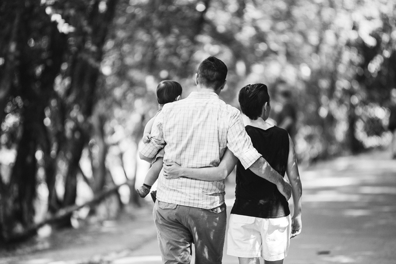 This documentary photograph of a family walking in Jamaica Pond is one of the best family photographs of 2016