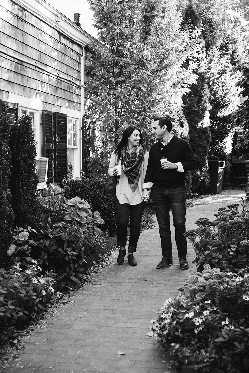 A documentary photograph of a couple walking together during their honeymoon photo session on Martha's Vineyard