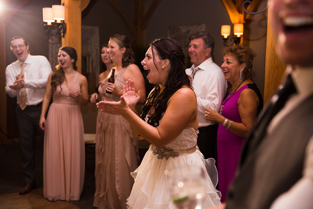 A documentary photograph of a guests dancing during a Harrington Farm Wedding in Princeton, Massachusetts