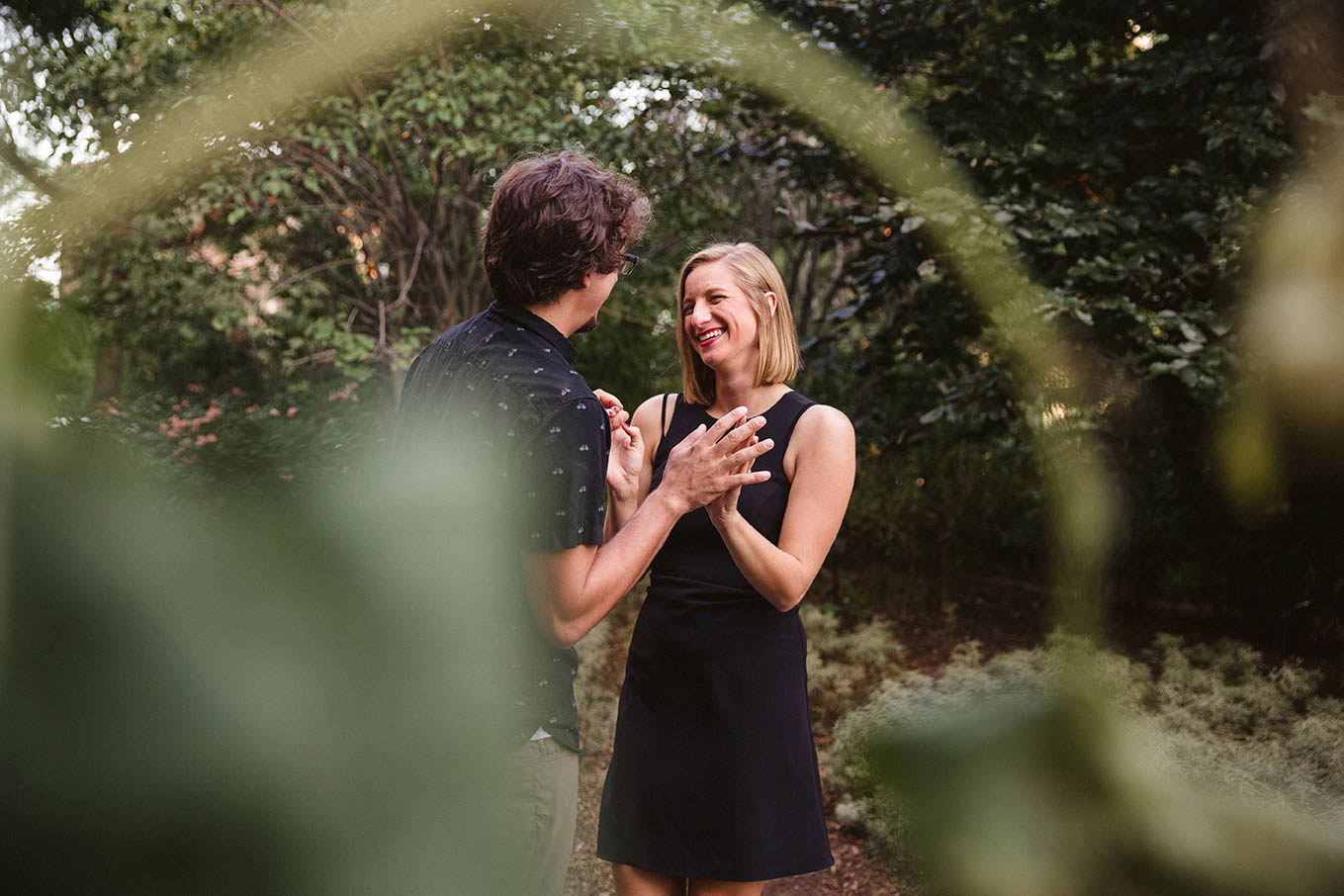 A documentary engagement session of a couple laughing together during their Boston Engagement session