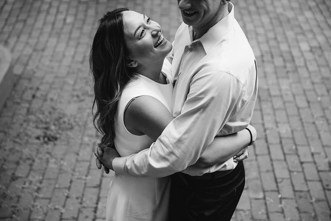 A documentary portrait of a couple hugging during their Boston Engagement Session