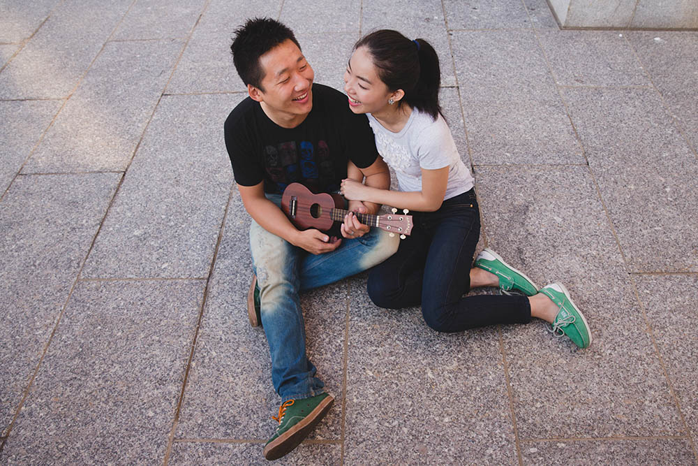 A documentary portrait of a couple hanging out near Back Bay Fens during their Boston engagement session