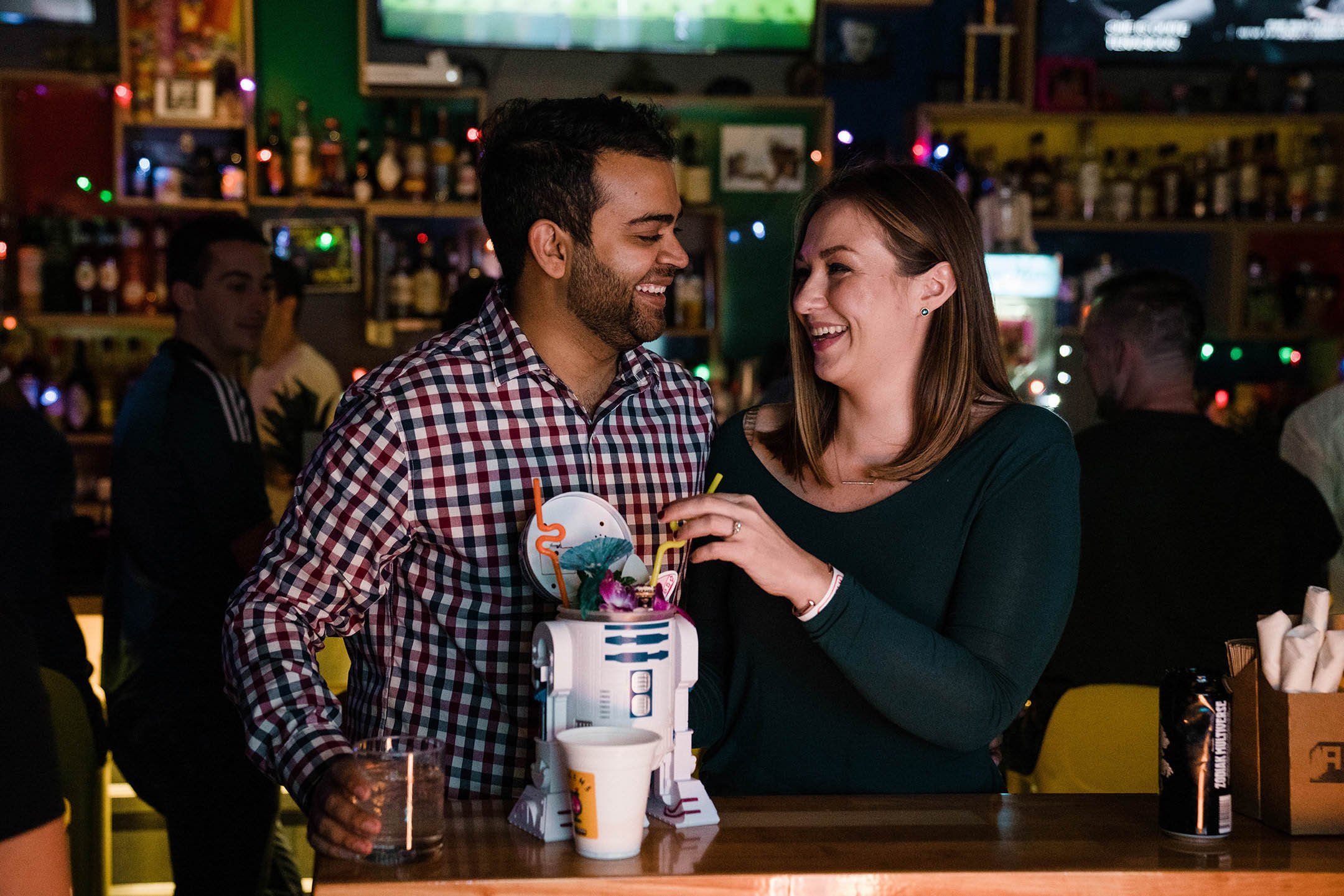 A documentary portrait of a couple hangin out at A4cade during their Boston engagement session