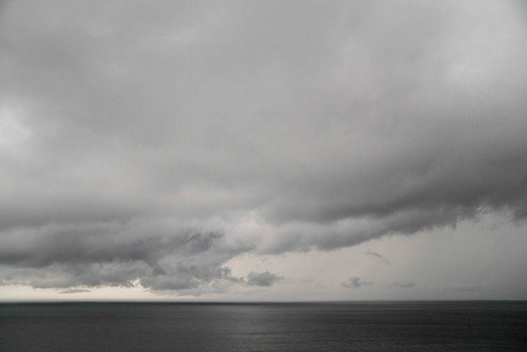 A documentary photograph of a storm brewing on the day of a Boston wedding