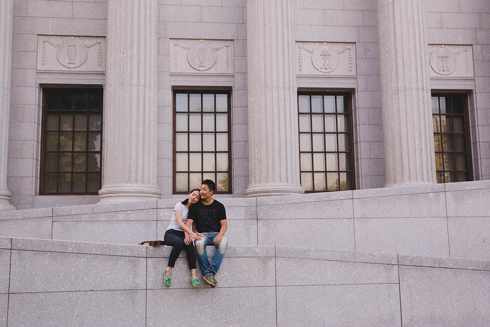 A documentary portrait of a couple hanging out at the Museum of Fine Art during their Boston engagement session