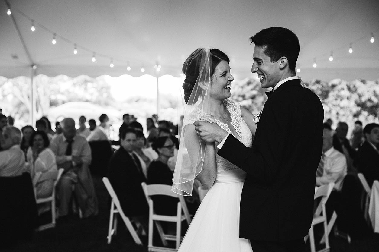 A documentary photograph of a bride and groom having their first dance at their Boston Wedding