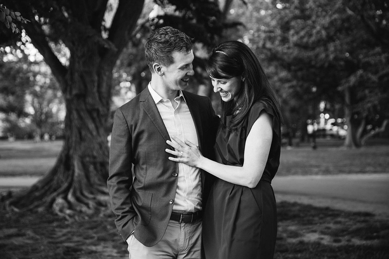 A documentary portrait of a couple hanging out at the Public Gardens during their Boston engagement session