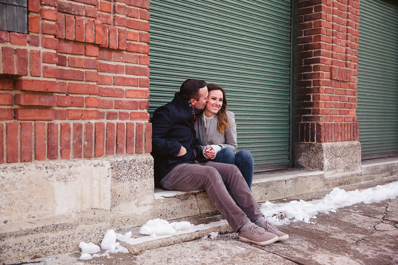 A documentary portrait of a couple hanging out at Fenway Park during their Boston engagement session