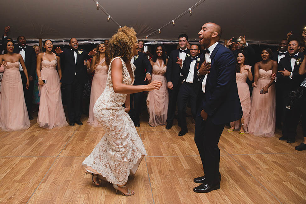 A documentary photograph of a bride and groom sharing their first dance at their wedding on Martha's Vineyard