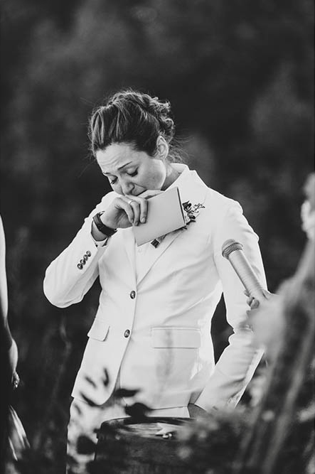 A documentary portrait of a bride crying during her wedding vows at a Kitz Farm wedding in New Hampshire