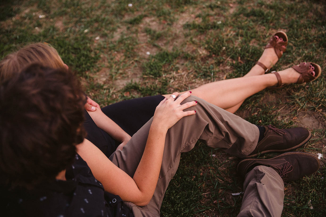 A documentary portrait of a couple hanging out at Prospect Hill during their Boston engagement session