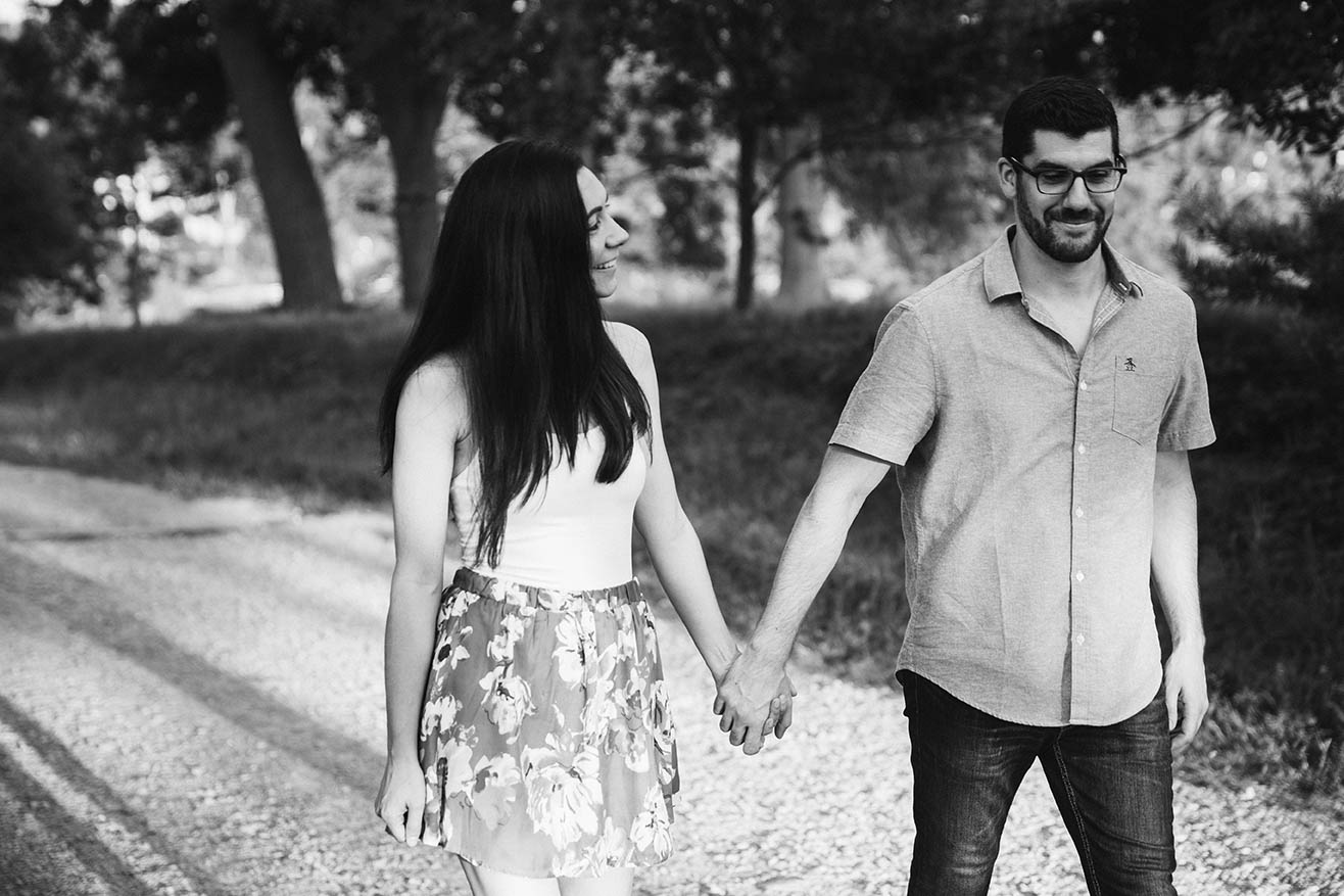 A documentary portrait of a couple walking together at the World's End during their Boston engagement session